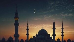 mosque silhouette at dusk with crescent moon and colorful sky photo